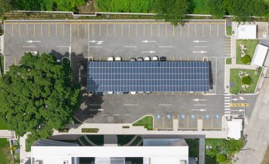 Empty parking lot with solar panel space in middle above top view clipart