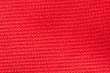 Kırmızı kumaş kumaş kumaş dokusu düz görünüm makrosu kapat 