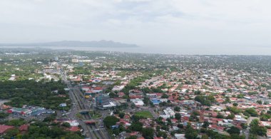 Managua, Nikaragua - 16 Ağustos 2024: Managua şehir manzarası gündüz hafif hava aracı görüntüsü