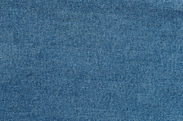 Lines on blue jeans fabric background macro close up view