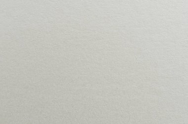 Matte bej renkli kağıt yüzey düz makro yakın görünüm