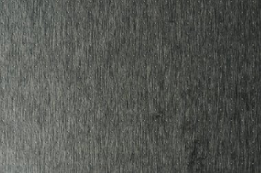 Delinmiş gri metal plaka makro yakın görüntü