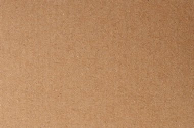 Sanat projeleri, ambalaj veya DIY faaliyetleri için uygun düz kahverengi karton levha ile el işi.