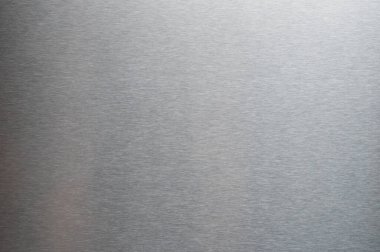 Parlak parlak Michine, yakın görüşlü, metal bir yüzey fırçaladı.