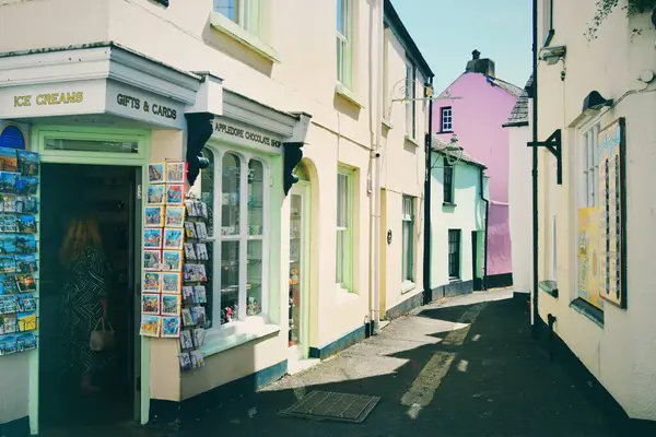 stock image An image of a cute side street in Appledore, Devon, England. A quaint, typically English souvenir shop is located on the corner. 