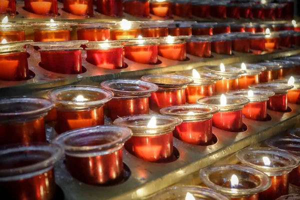 Red candles in Santiago de Compostela Cathedral, Galicia, Spain