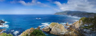 Ortigueira cliffs and atlantic ocean view, Galicia, Spain. Landmark : El mejor banco del mundo. Panoramic view