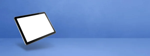 Mavi Arka Planda Yüzen Boş Bir Tablet Bilgisayar Boyutlu Izole — Stok fotoğraf