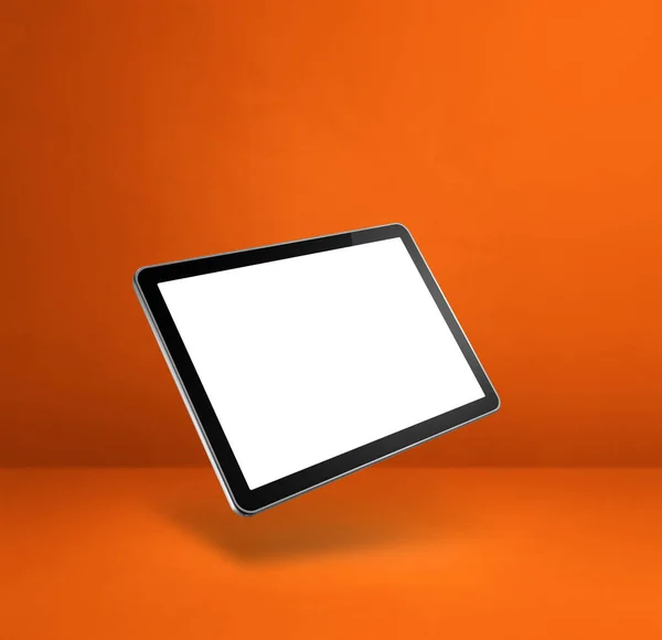 Κενό Tablet Επιπλέει Πάνω Από Ένα Πορτοκαλί Φόντο Απομονωμένη Απεικόνιση — Φωτογραφία Αρχείου