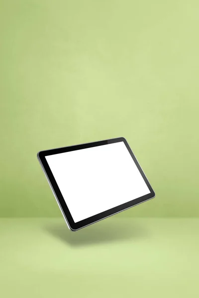 緑の背景に浮かぶ空白のタブレットPcコンピュータ 3D分離イラスト 垂直テンプレート — ストック写真