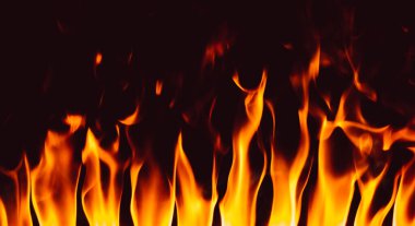 Flames in fireplace. Texture background isolated on a black background clipart