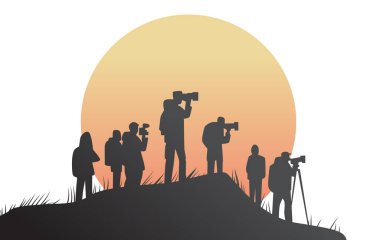 Photographers silhouette group capturing sunset scene. Silhouetted individuals with cameras and tripods on hilltop against large setting sun background. Vector illustration. clipart