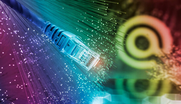 email signs with network cable on Fiber optics background,communication concept