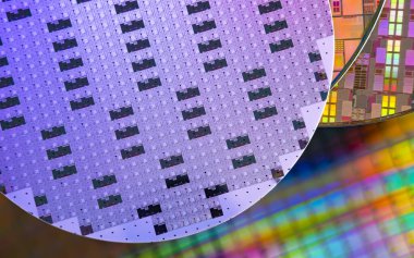 Silicon Wafers with microchips used in electronics for the fabrication of integrated circuits clipart