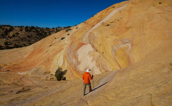 Hike in the Utah mountains. Hiking in unusual natural landscapes. Fantastic forms sandstone formations.