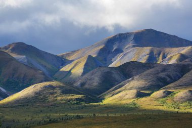Beautiful high mountains in Alaska, United States. Amazing natural background.
