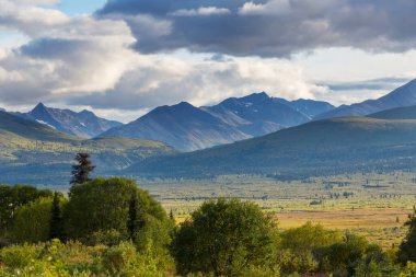 Beautiful high mountains in Alaska, United States. Amazing natural background.