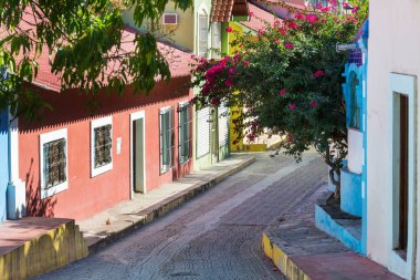 Amazing colorful buildings in pueblo magico Batopilas in Barrancas del Cobre mountains, Mexico