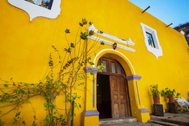 Amazing colorful buildings in pueblo magico Batopilas in Barrancas del Cobre mountains, Mexico