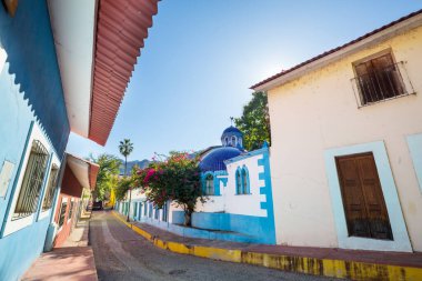 Amazing colorful buildings in pueblo magico Batopilas in Barrancas del Cobre mountains, Mexico