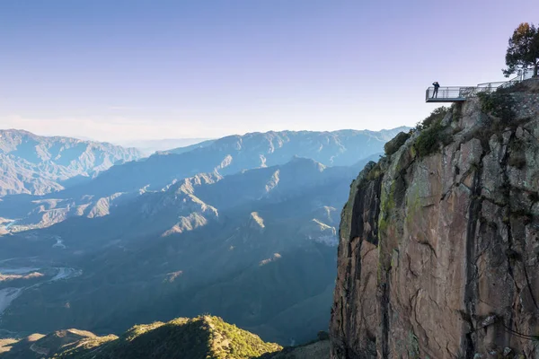 stock image Man on the suspension bridge in Barrancas mountains, Mexico