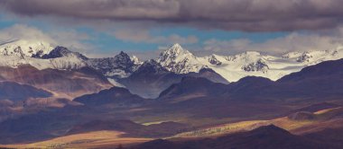 Beautiful high mountains in Alaska, United States. Amazing natural background.