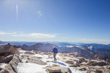 The climb in snowy mountains in the summer season