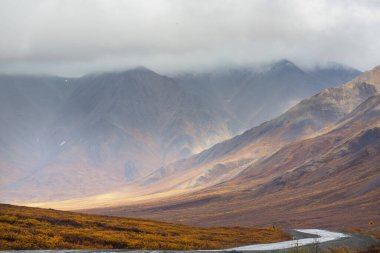 Tundra landscapes above Arctic circle in autumn season. Beautiful natural background.
