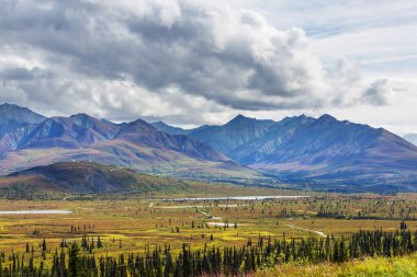 Beautiful high mountains in Alaska, United States. Amazing natural background.