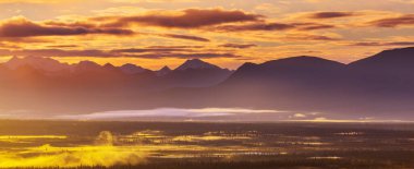 Beautiful high mountains in Alaska, United States. Amazing natural background.