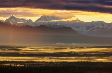 Beautiful high mountains in Alaska, United States. Amazing natural background.