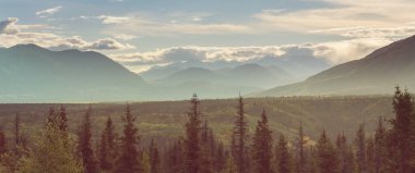 Beautiful high mountains in Alaska, United States. Amazing natural background.