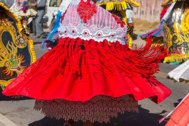 Girls in authentic costumas dancing during the traditional festival. Caraz region, Peru, South America clipart