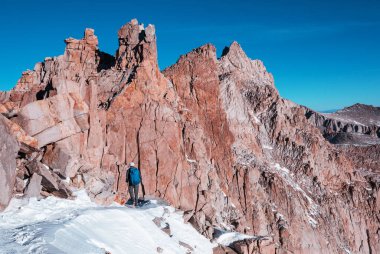 The climb in snowy mountains in the summer season