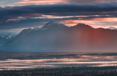 Beautiful high mountains in Alaska, United States. Amazing natural background.