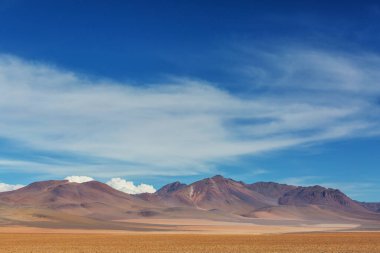 Epic Salvador Dali desert. Unusual natural landscapes in Bolivia. clipart