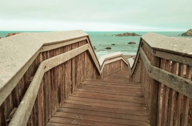 boardwalk on the tropical beach clipart