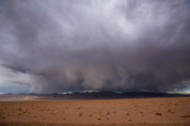 Rain clouds in arctic tundra