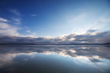 Beautiful serene lake in sunny day