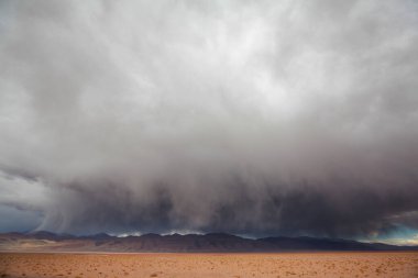 Rain clouds in arctic tundra