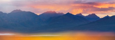 Beautiful high mountains in Alaska, United States. Amazing natural background.