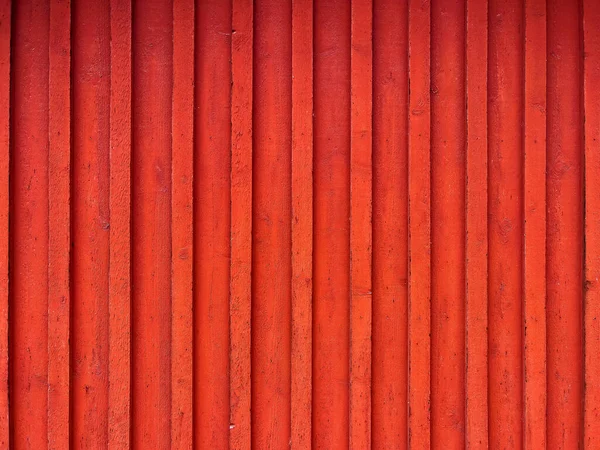 背景として伝統的なスカンディナヴィアの赤い木製のファサードパターン — ストック写真