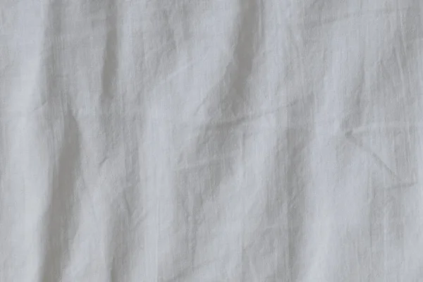 Морщинистые Белые Простыни Спальне Качестве Фона Вид Сверху — стоковое фото