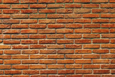 Rustic brown rough brick wall surface pattern as texture. Scandinavian architecture style background.