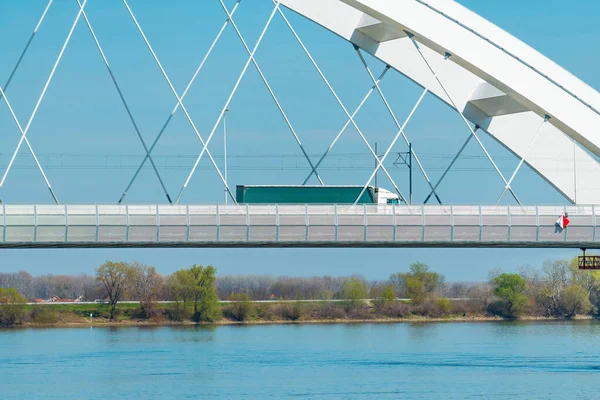 Semi truck crossing the bridge over Danube river in Novi Sad, Serbia