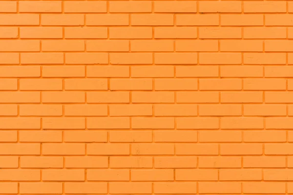 グラフィックデザイン要素と背景として鮮やかなオレンジ色のレンガの壁のパターン 家の外観の質感 — ストック写真