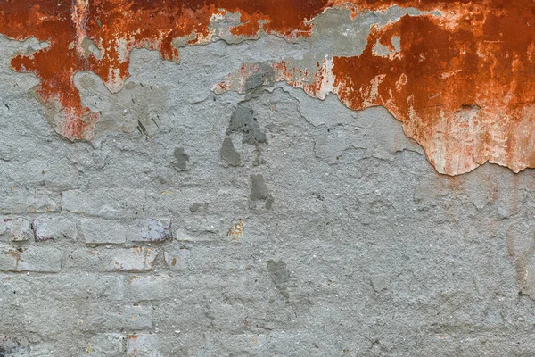 背景や都市の質感としてレンガのパターンを持つ古いモルタルの壁 — ストック写真