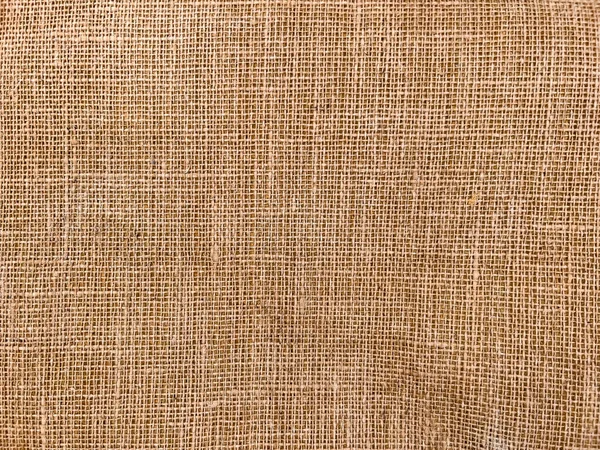 背景および質として編まれた合成ジュートのカーペットの裏付けパターン — ストック写真