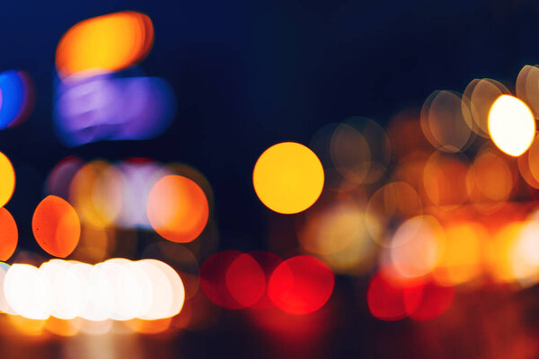 Colorful night bokeh pattern as abstract background, selective focus