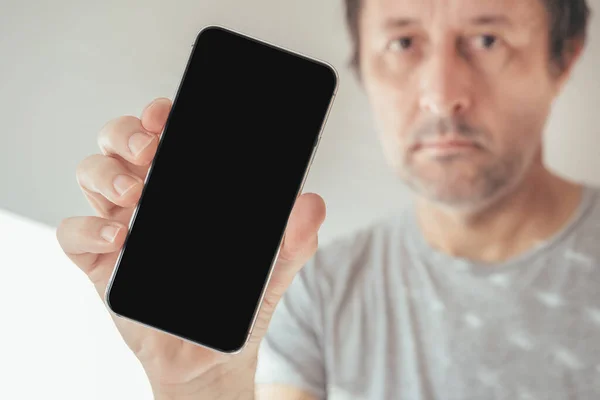 Man Holding Mobile Phone Blank Black Screen Mockup Copy Space — Stock Photo, Image